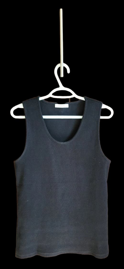 Black ribbed sleeveless vest on a white hanger