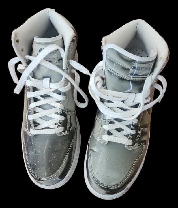Silver-gray high-top sneakers with white laces
